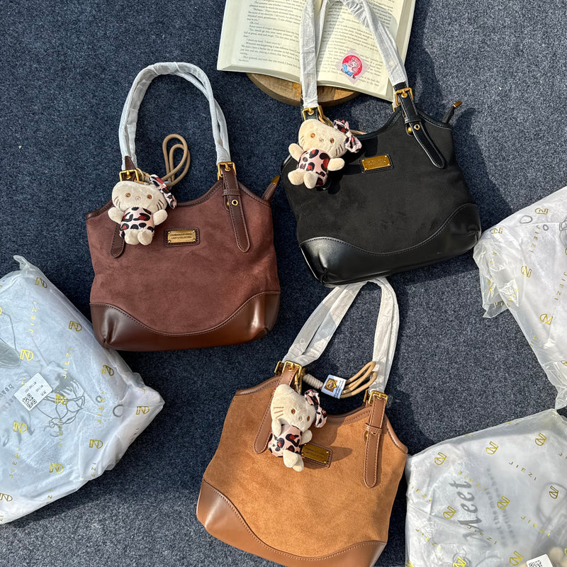 Hello Kitty Suede Handbags